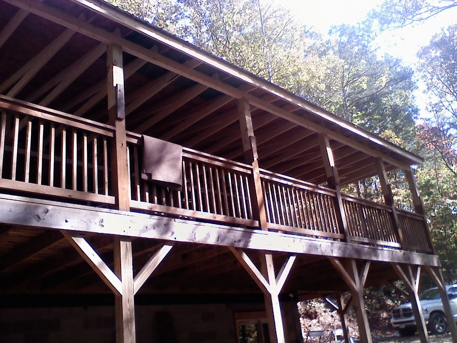 Timber framing under a new elevated porch and deck — Roof Leak Repair in Conrad by Roofing Brothers